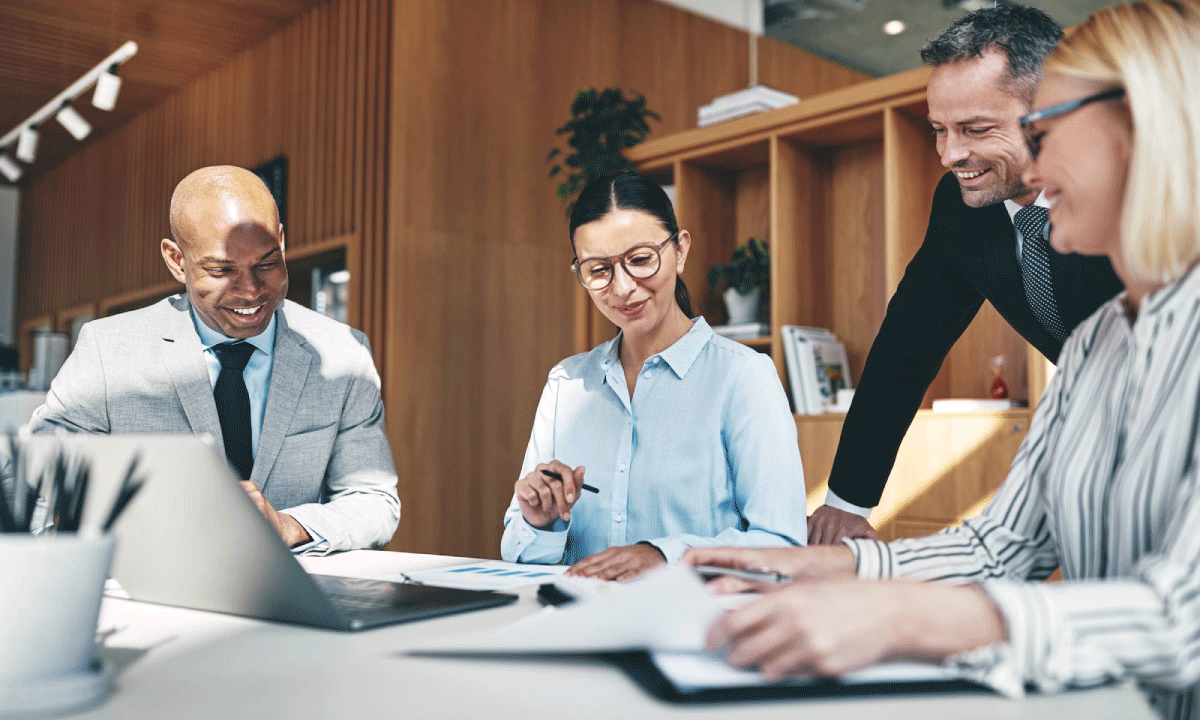 Financial auditors reviewing corporate financial statements